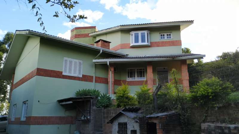 Casa 4 Dormitórios  sendo 1 suíte,  no Petrópolis em Taquara